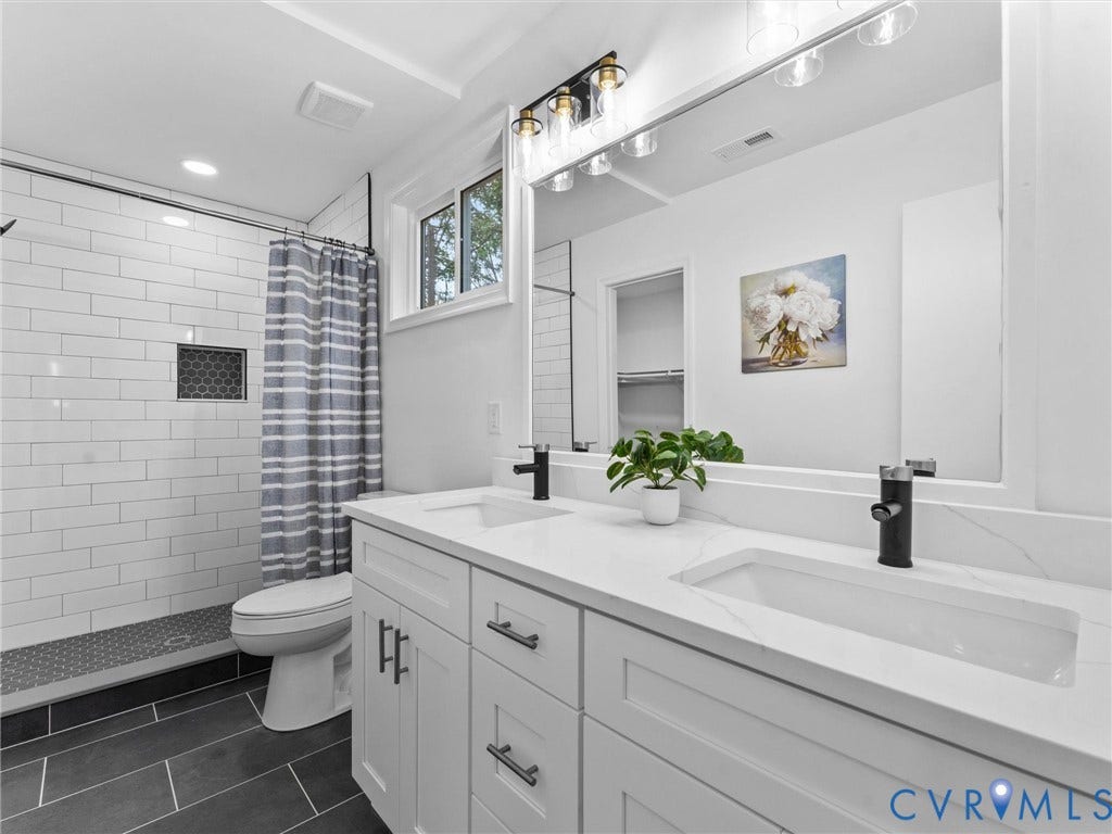 3626 Reynolds Road, Richmond, VA 23223 Dual vanity with integrated rectangular sinks and white countertops