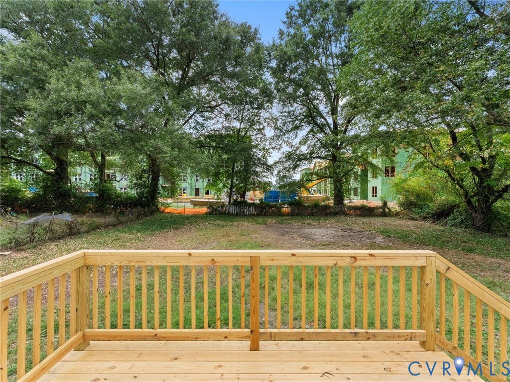 3626 Reynolds Road, Richmond, VA 23223 Wood deck with natural finish, featuring wood railings and steps