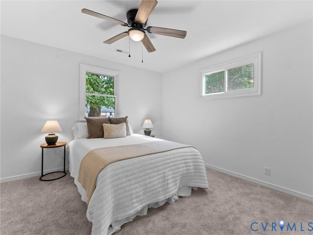 3626 Reynolds Road, Richmond, VA 23223 Recessed lighting, ceiling fan with light fixture, two windows, and light-colored carpeting