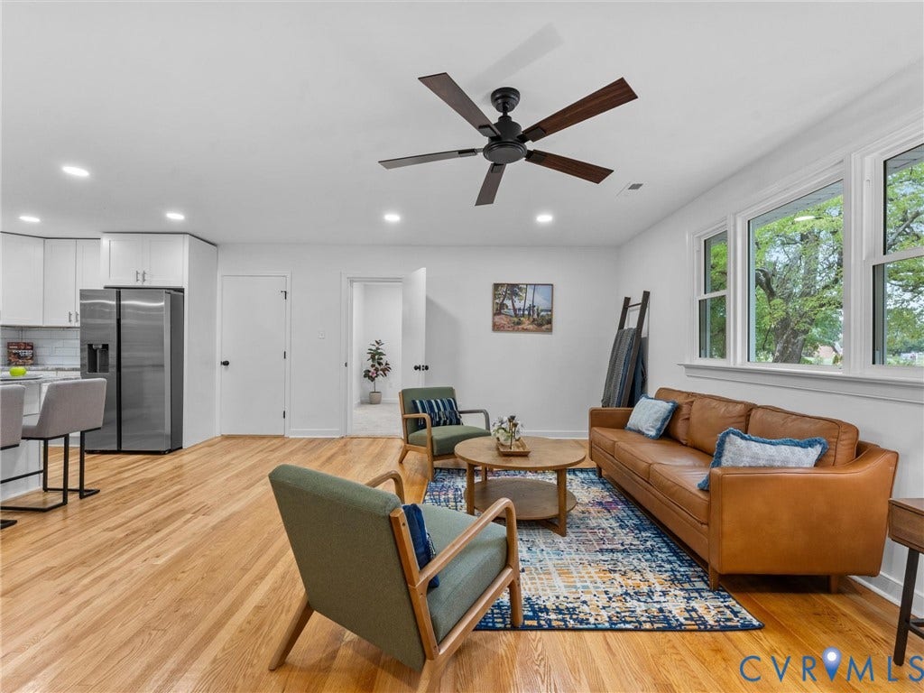 3626 Reynolds Road, Richmond, VA 23223 Open-concept living space featuring wood-finish flooring, a contemporary ceiling fan, and recessed lighting
