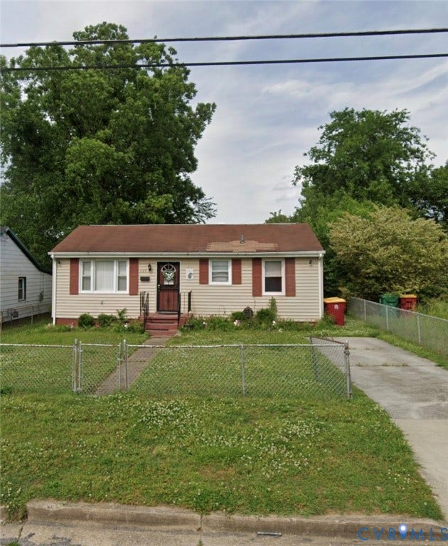 1109 Hilton Place, Petersburg, VA 23803 Single-story residence featuring light-colored siding and a red shingle roof