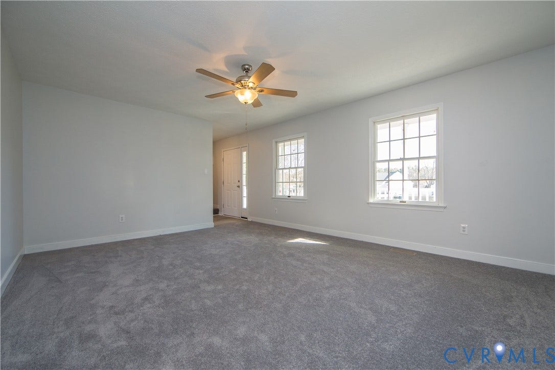 19224 Maurer Lane, Colonial Heights, VA 23834 Spacious room with gray carpeting and light-toned walls