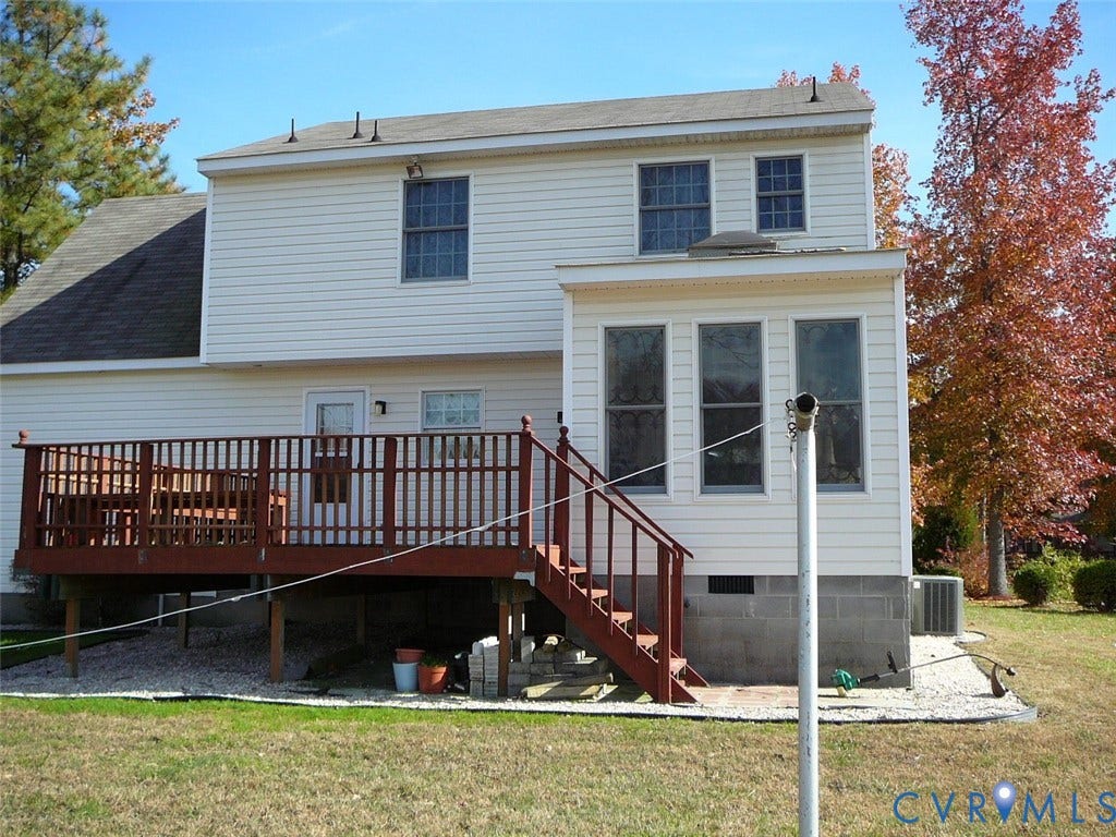 19224 Maurer Lane, Colonial Heights, VA 23834 Rear exterior with white siding and a brown wood-finish deck