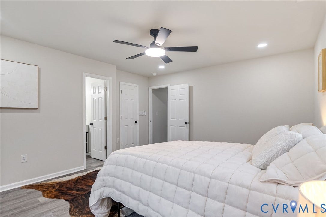 Wood-finish flooring, recessed lighting, and a modern ceiling fan
