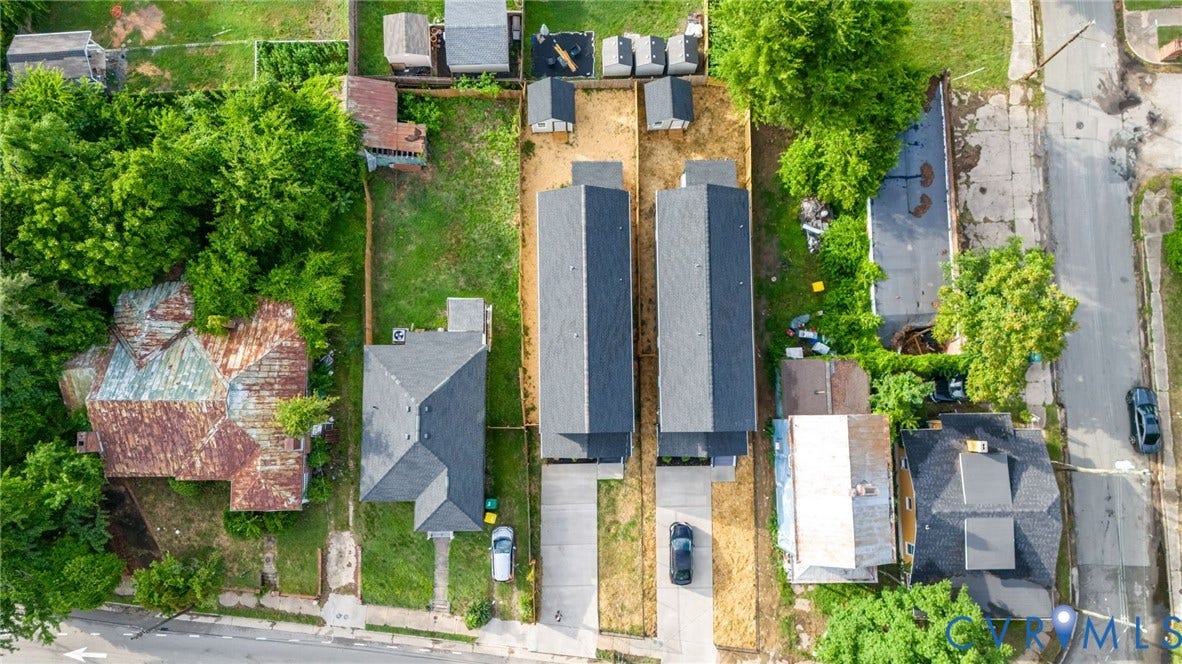 Paved driveways, two newly roofed structures