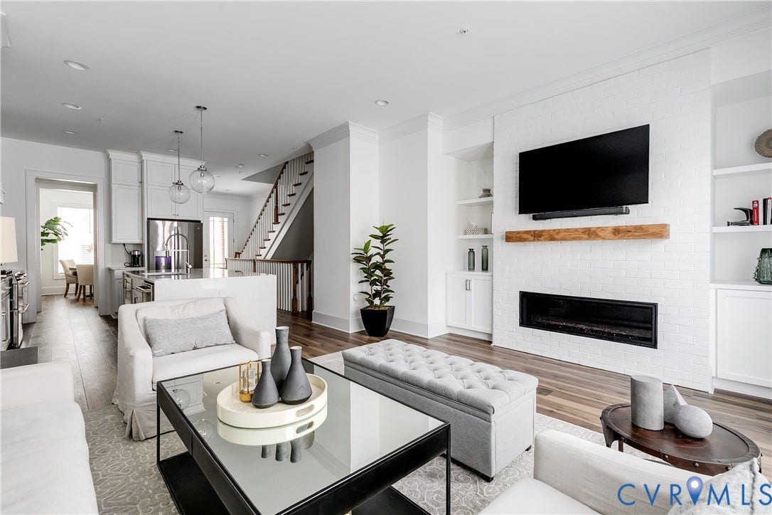 Family Room Open to Kitchen with built-ins and Fireplace