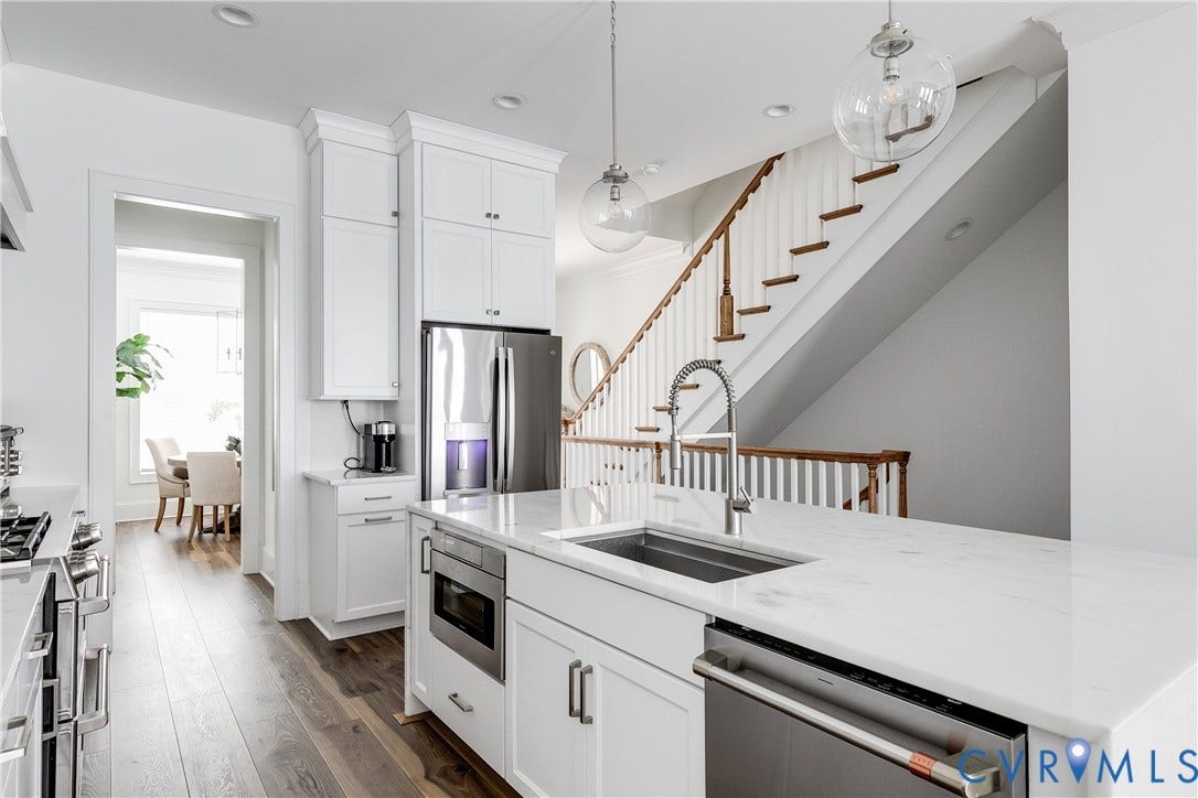 View to Dining Room and Open Stairwell