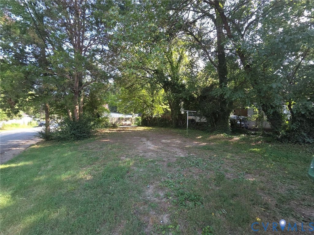 3400 Decatur Street, Richmond, VA 23224 Expansive lot featuring mature trees and established greenery