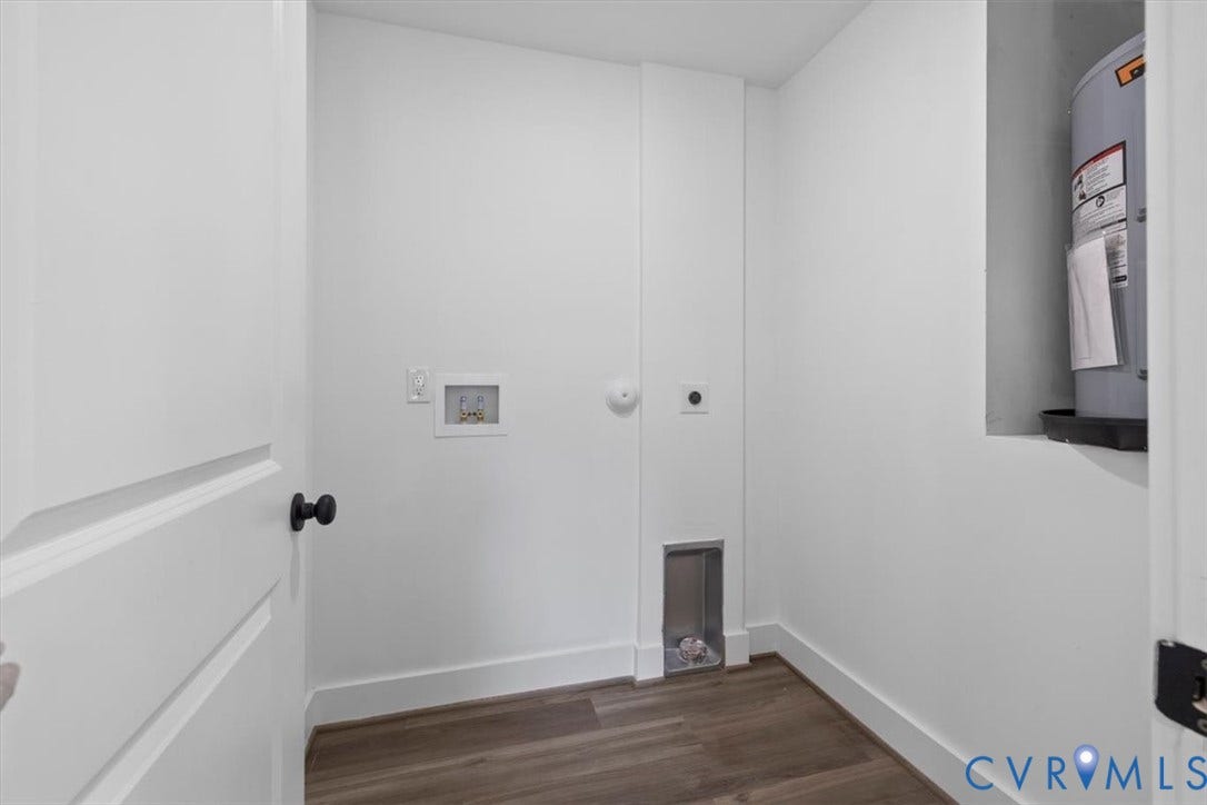 2242 Lakeview Drive, Powhatan, VA 23139 Dedicated utility area featuring wood-finish flooring, white walls, and a built-in water heater alcove