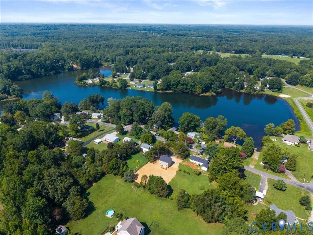 2242 Lakeview Drive, Powhatan, VA 23139 Expansive water body surrounded by dense green foliage