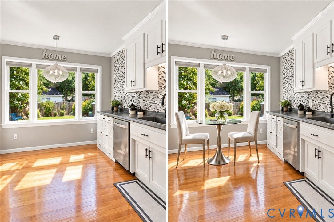 Hardwood flooring, white cabinetry with dark hardware, dark countertops, mosaic tile backsplash, and a large window with natural light VIRTUALLY STAGED