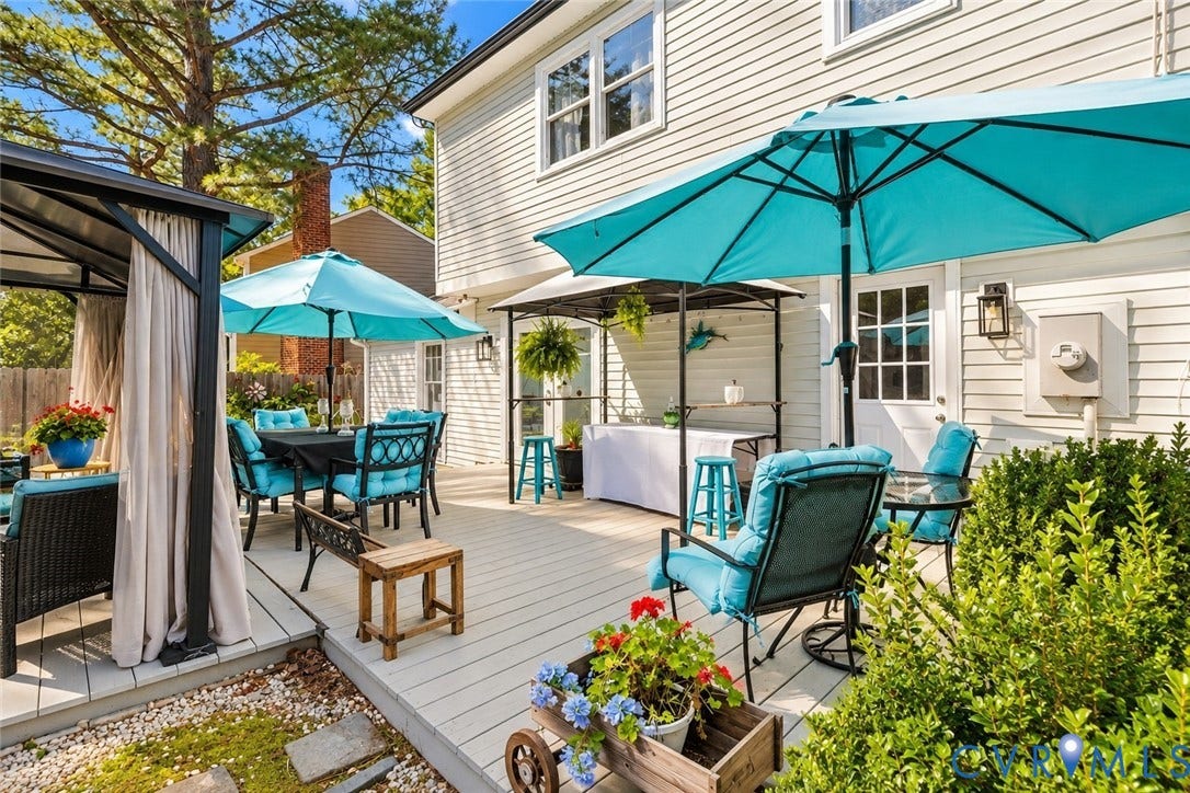 Expansive exterior deck, multiple outdoor seating areas