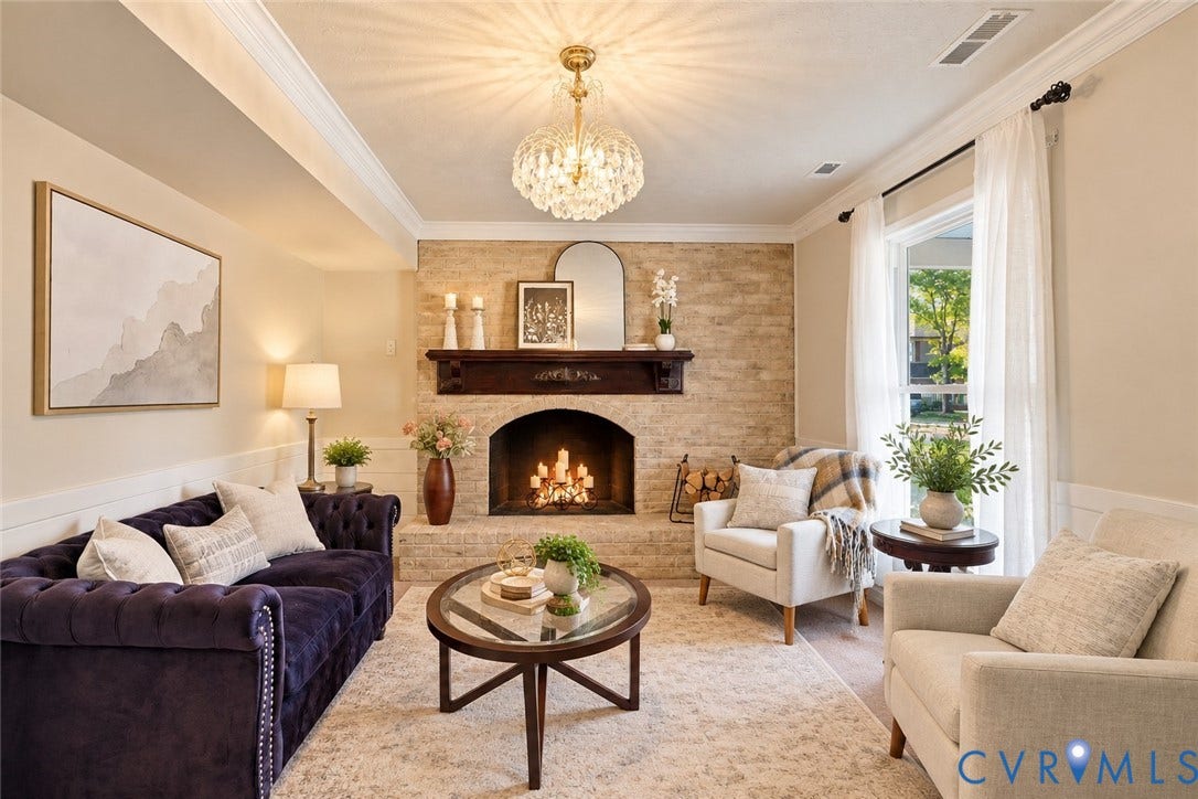 Stone-clad fireplace with a wood mantel