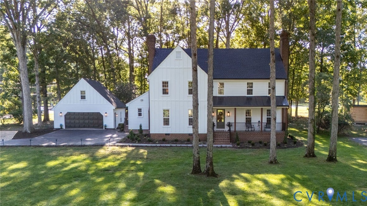 13800 W Salisbury Road, Salisbury, Midlothian, VA 23113 Two-story residence with a covered front porch and brick foundation