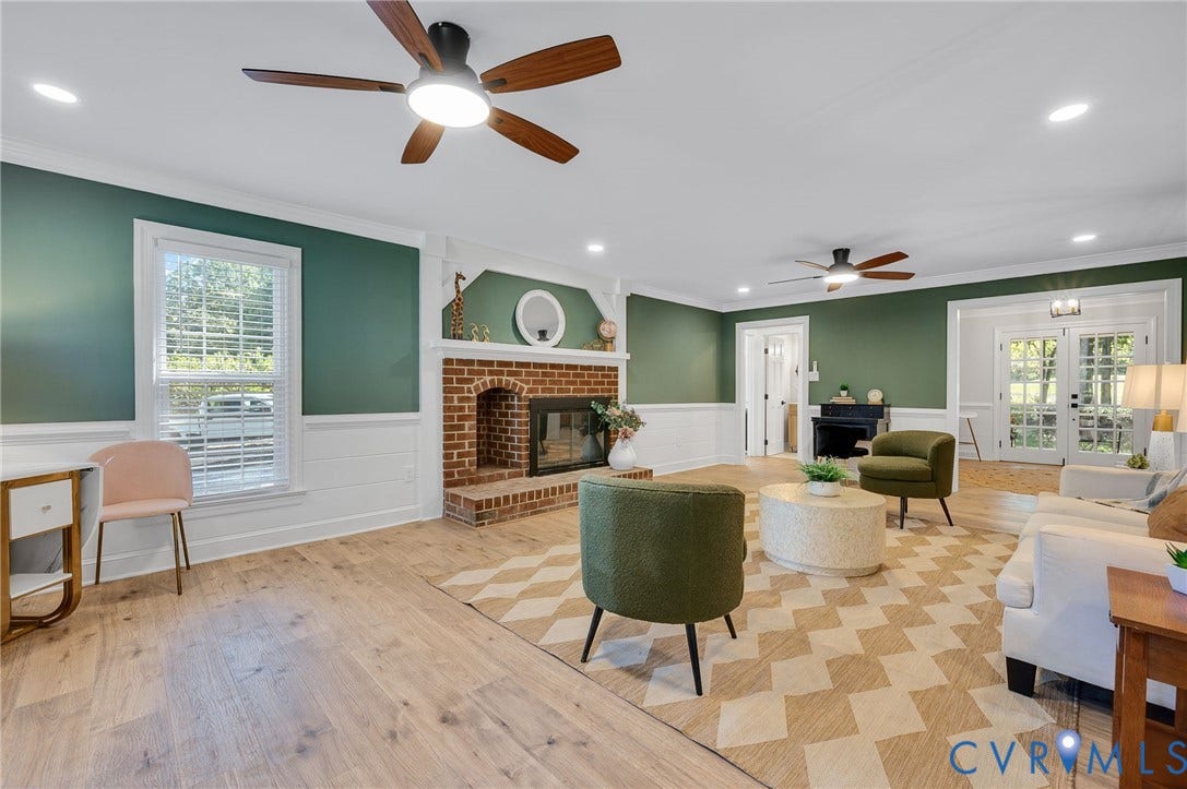 13800 W Salisbury Road, Salisbury, Midlothian, VA 23113 Brick fireplace with a classic mantel, wood-finish flooring, recessed lighting, and dual ceiling fans