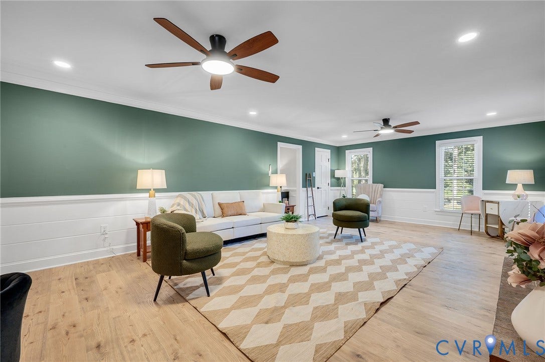 13800 W Salisbury Road, Salisbury, Midlothian, VA 23113 Spacious room featuring wood-finish flooring, two ceiling fans, recessed lighting, and white wainscoting