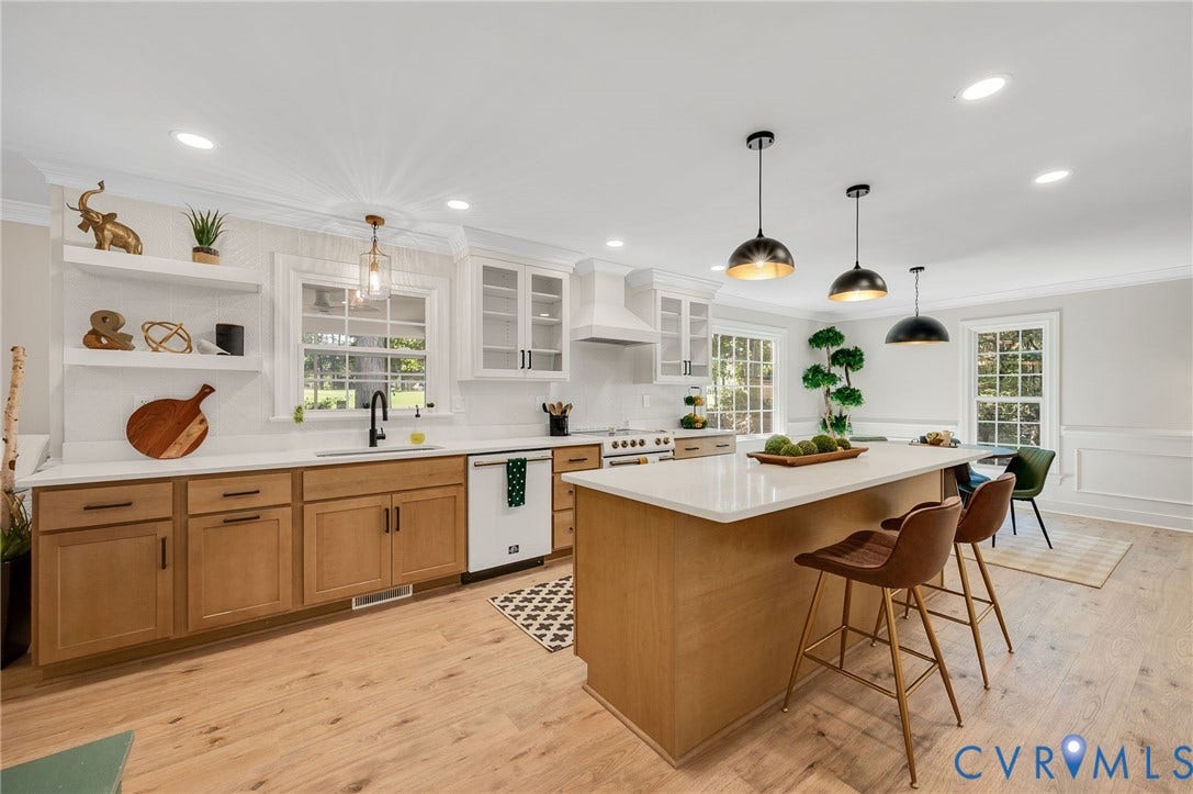 13800 W Salisbury Road, Salisbury, Midlothian, VA 23113 Open-concept kitchen featuring light wood-finish flooring, a central island with a light-toned countertop, and recessed lighting