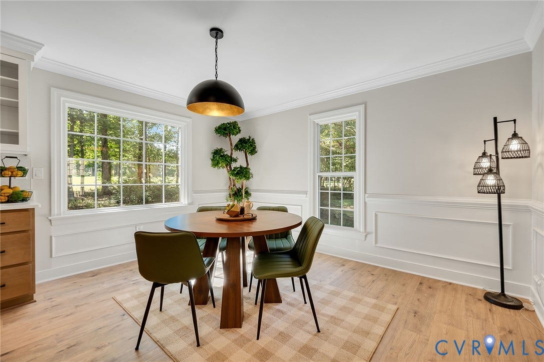 13800 W Salisbury Road, Salisbury, Midlothian, VA 23113 Crown molding and wainscoting details, wood-finish flooring, and multiple windows with grid patterns