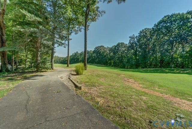 8113 Ainsdale Lane, Chesterfield, VA 23832 Expansive green space bordered by mature trees and a paved path