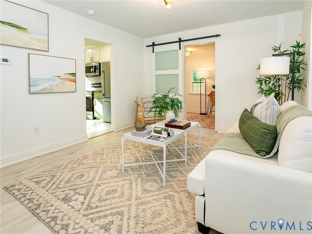 1601 N 25th Street, Richmond, VA 23223 Light wood-finish flooring complements white walls