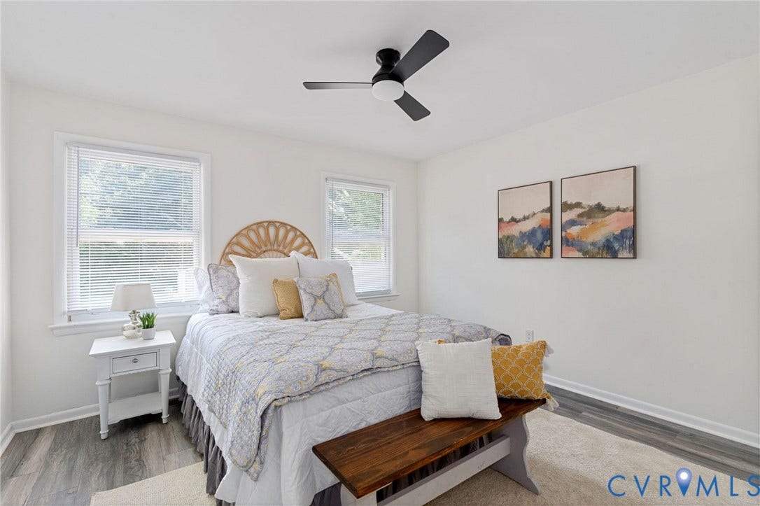 White walls with wood-finish flooring