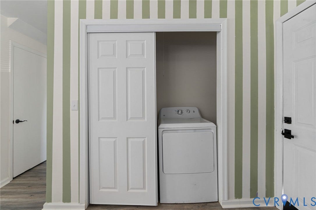 Dedicated laundry closet with bi-fold doors