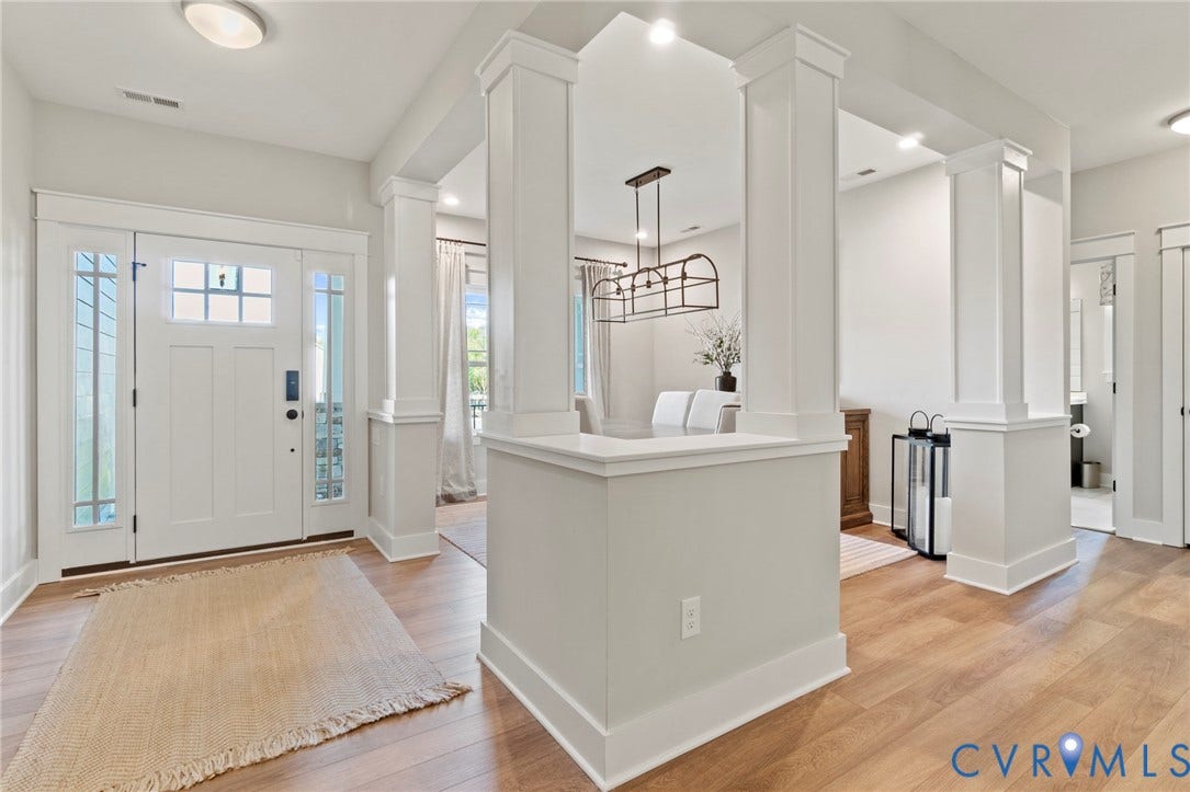 9143 Terroir Lane, Villas, New Kent, VA 23124 Entryway featuring wood-finish flooring, a white paneled front door with sidelights, recessed lighting, and architectural columns