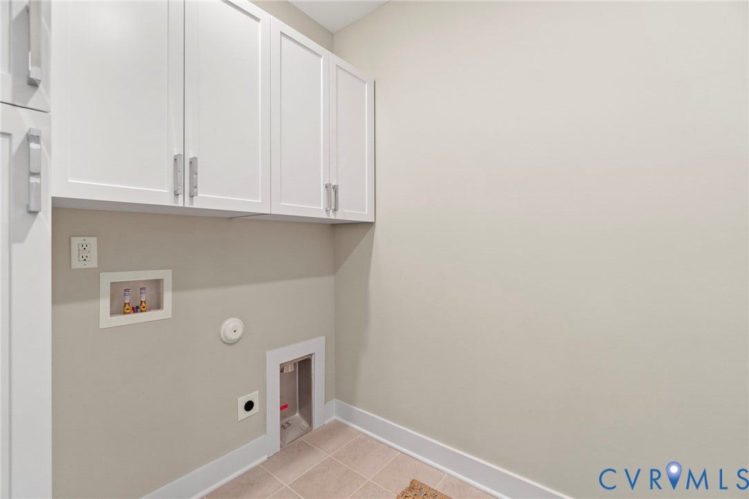 9143 Terroir Lane, Villas, New Kent, VA 23124 White shaker cabinetry with polished chrome hardware