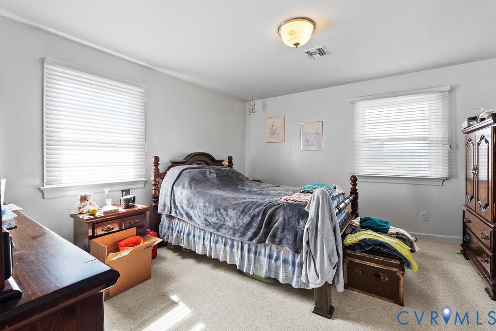 21 Vanderpool Lane, Detached, Cumberland, VA 23040 Carpeted room with a ceiling-mounted light fixture and two windows