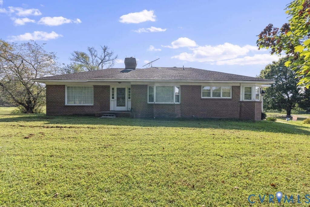 21 Vanderpool Lane, Detached, Cumberland, VA 23040 Brick exterior residence featuring a covered front entry, multiple windows, and a shingle roof