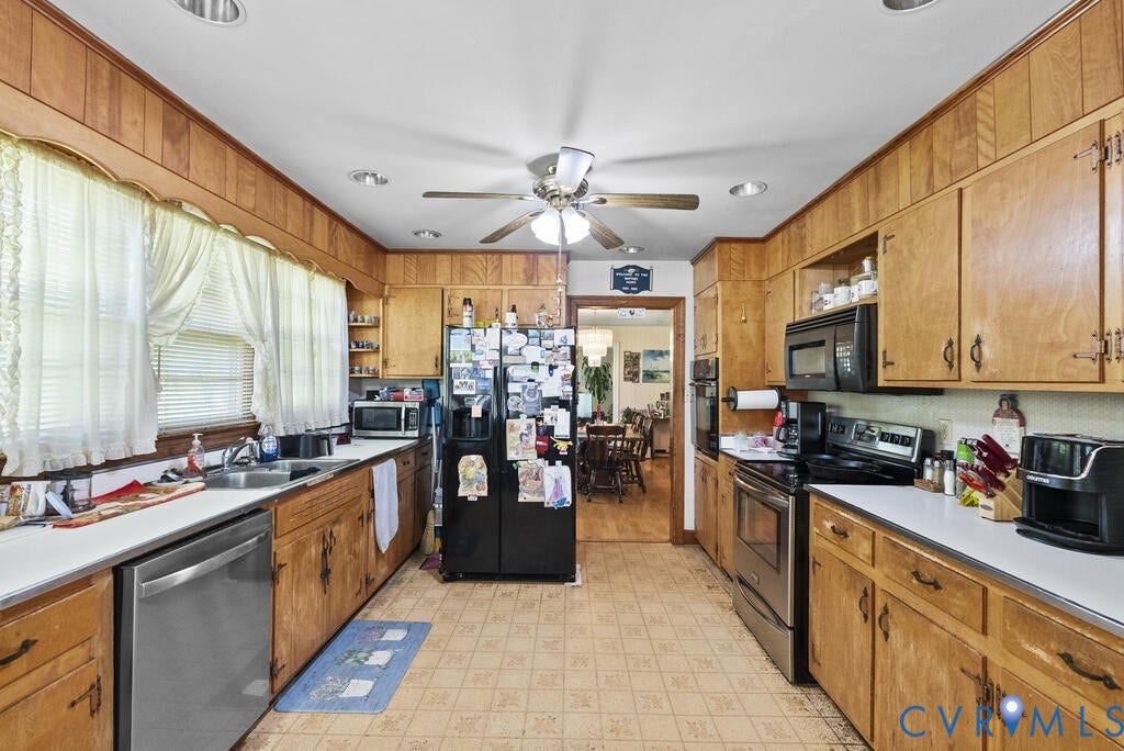21 Vanderpool Lane, Detached, Cumberland, VA 23040 Galley kitchen featuring wood cabinetry, white countertops, a stainless steel dishwasher, and recessed lighting