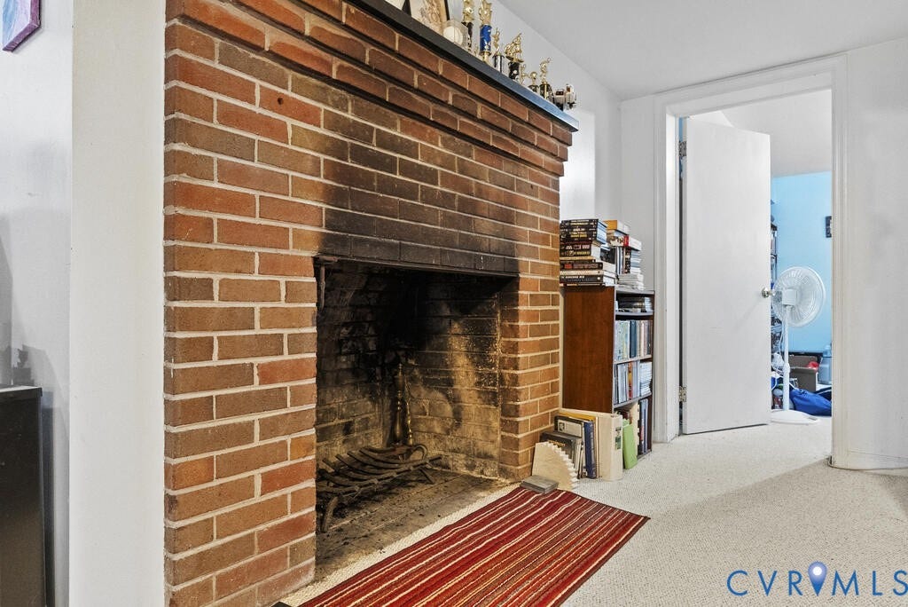 21 Vanderpool Lane, Detached, Cumberland, VA 23040 Brick fireplace with a dark mantel