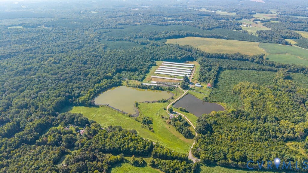 21 Vanderpool Lane, Detached, Cumberland, VA 23040 Expansive rural property featuring two ponds, agricultural buildings, and extensive wooded areas