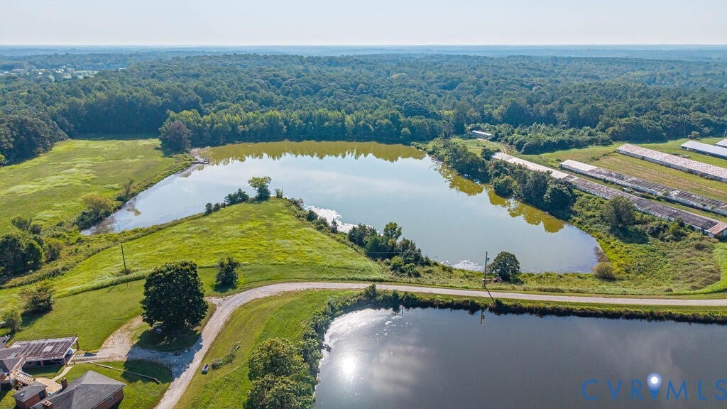 21 Vanderpool Lane, Detached, Cumberland, VA 23040 Expansive property featuring two large ponds, verdant fields, and extensive wooded areas