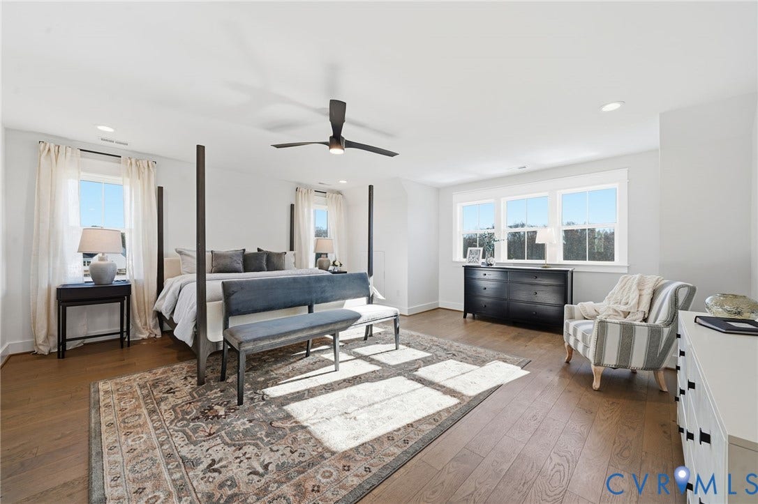 9169 Terroir Lane, Villas, New Kent, VA 23124 Spacious room featuring wood-finish flooring, multiple windows, recessed lighting, and a ceiling fan