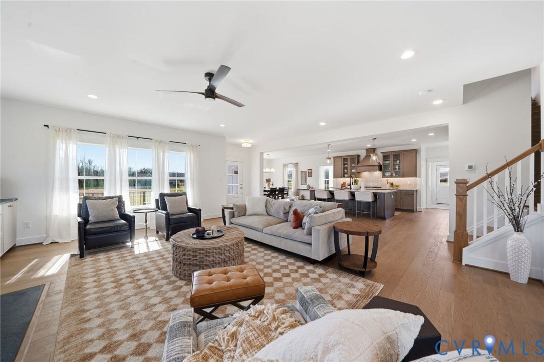 9169 Terroir Lane, Villas, New Kent, VA 23124 Open-concept living area with wood-finish flooring, recessed lighting, and a ceiling fan