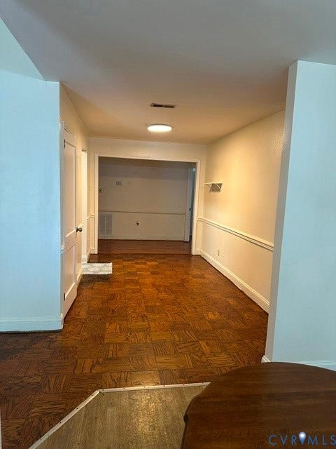 7617 Sunny Bank Drive, Henrico, VA 23228 Parquet wood flooring, white trim, recessed lighting, and wall molding