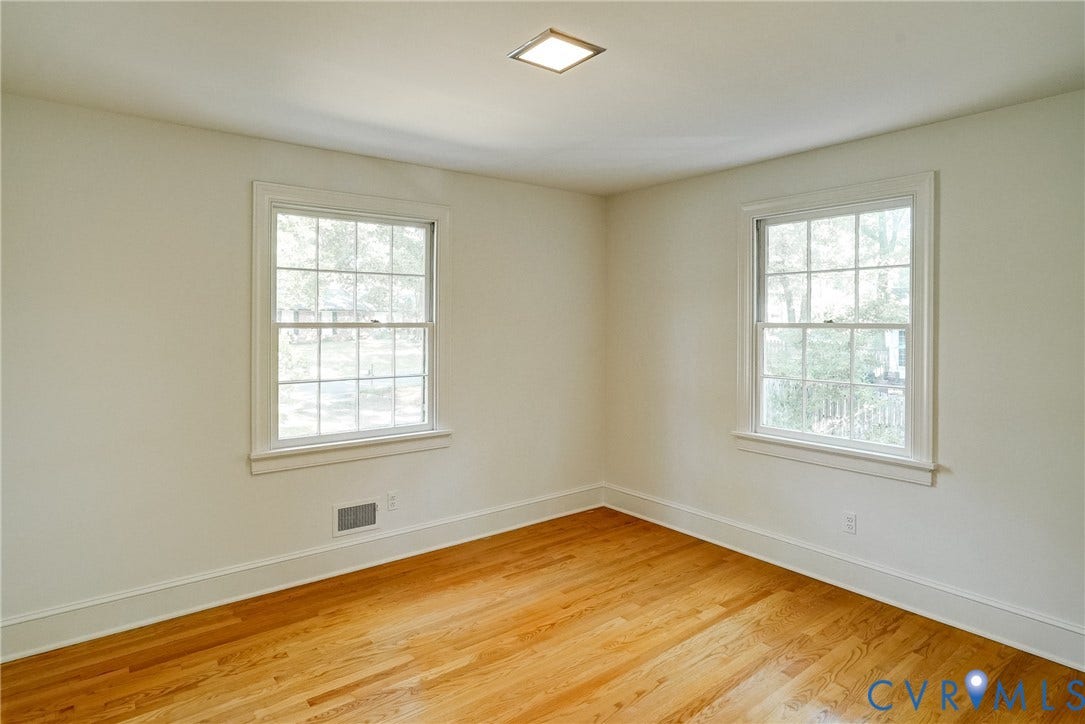 1407 W Monmouth Court, Henrico, VA 23238 Bedroom #3 with hardwood flooring, closet and overhead lighting.