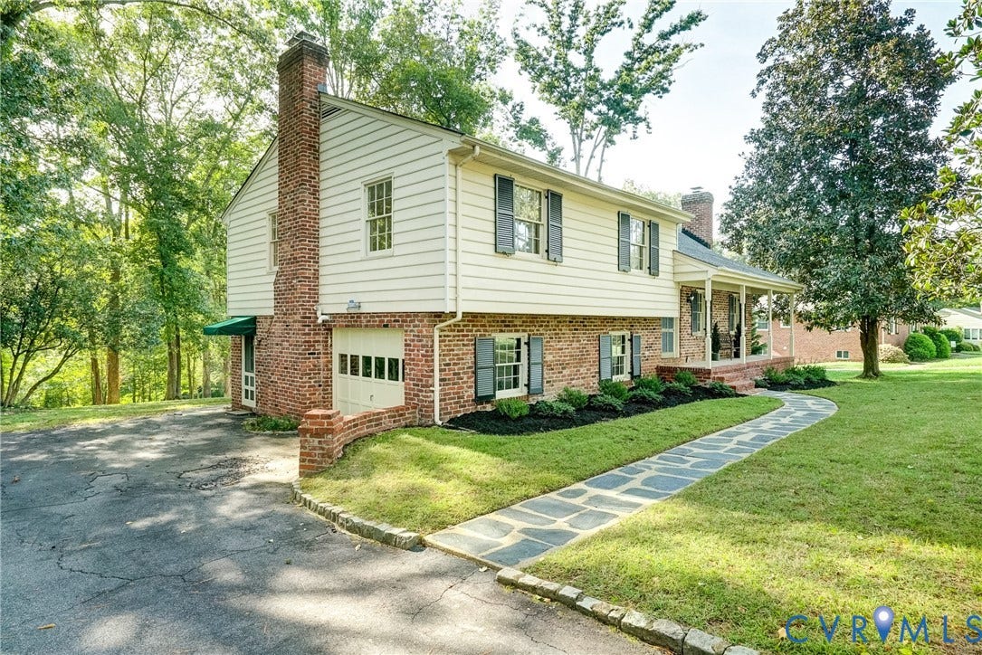 1407 W Monmouth Court, Henrico, VA 23238 Low maintenance brick and vinyl exterior with one car garage