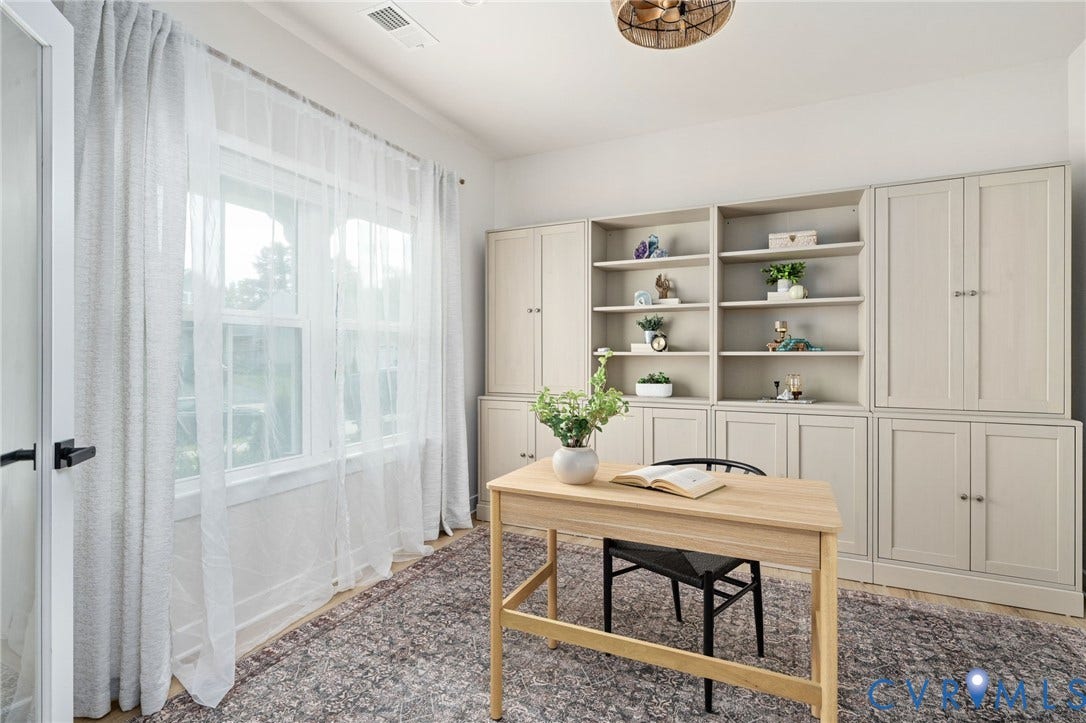 1961 Enon Station Drive, Chester, VA 23836 Built-in cabinetry with open shelving and closed storage, large window, and wood-finish flooring