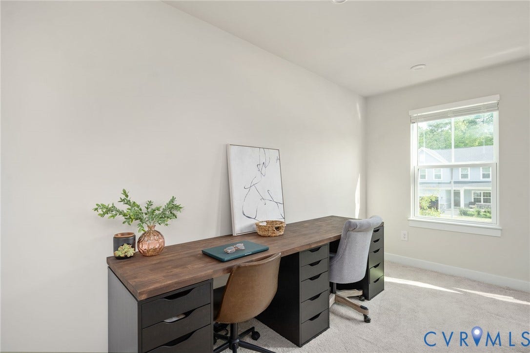1961 Enon Station Drive, Chester, VA 23836 Room featuring a rectangular window, light-colored walls, and neutral carpeting