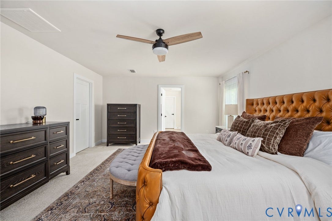 1961 Enon Station Drive, Chester, VA 23836 Carpeted room featuring light-colored walls and a ceiling fan