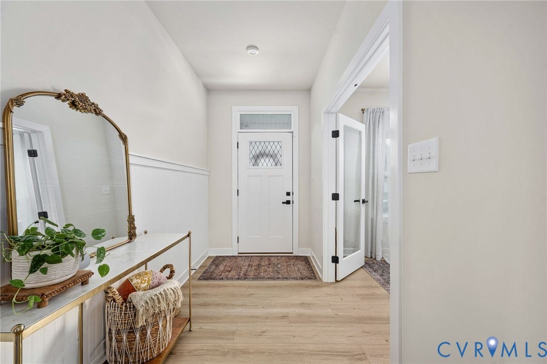 1961 Enon Station Drive, Chester, VA 23836 Light wood-finish flooring extending throughout the space