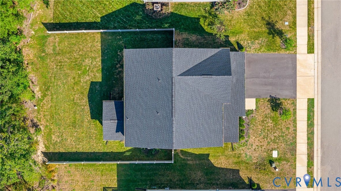 1961 Enon Station Drive, Chester, VA 23836 Asphalt shingle roofing, paved driveway, concrete sidewalk, and a manicured lawn