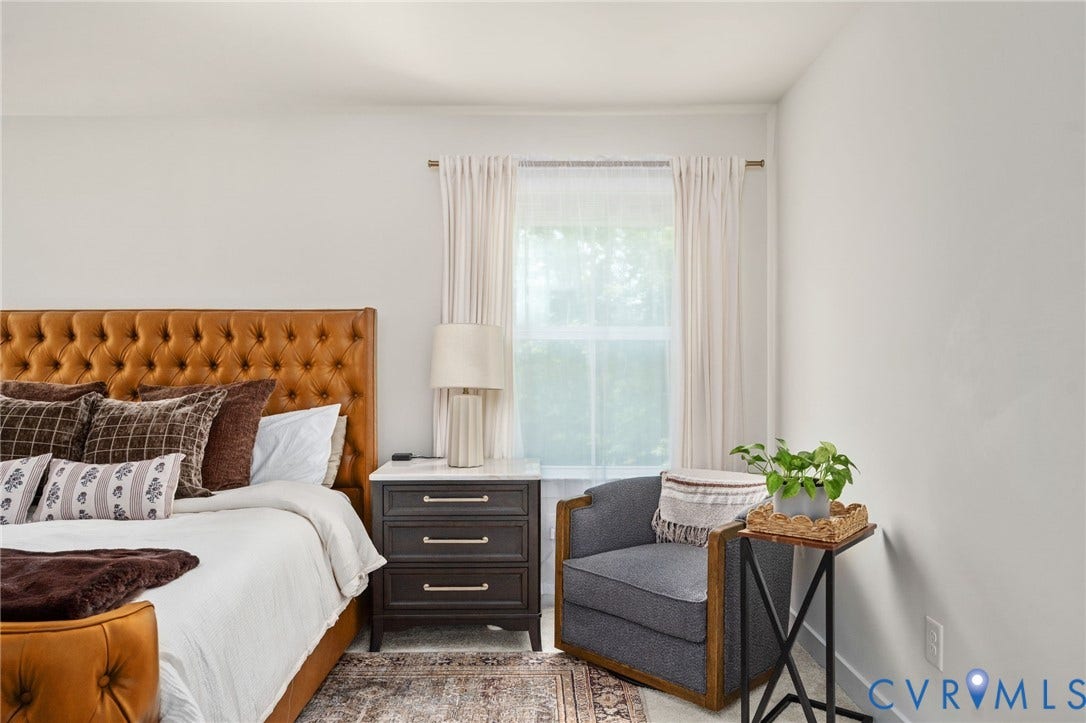 1961 Enon Station Drive, Chester, VA 23836 White walls complement the natural light from a window with white drapes