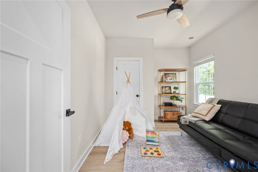 1961 Enon Station Drive, Chester, VA 23836 Recessed lighting, wood-finish flooring, white paneled doors with black hardware, and a ceiling fan with light fixture