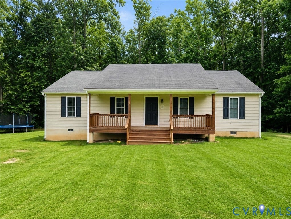 289 Winding Ridge Way, Winding Ridge, Bumpass, VA 23024 Ranch-style residence featuring a covered front porch with wood railings and steps, light-colored siding, and dark shutters