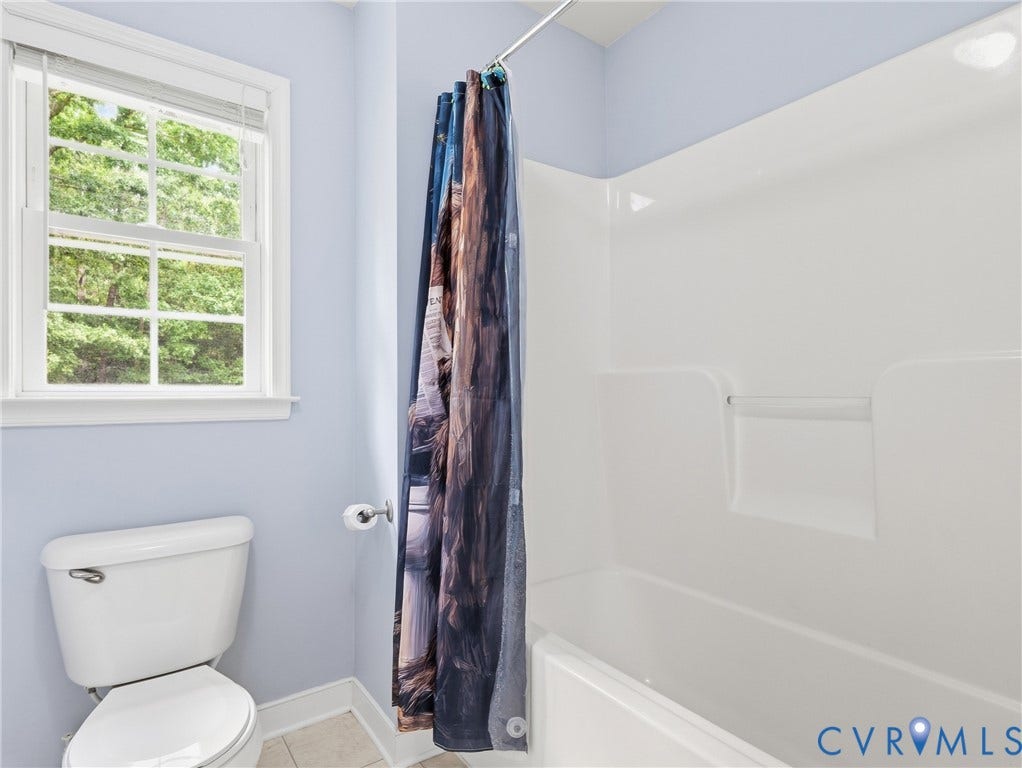 8325 Caroline Vines Way, Estates At Willis Church, Henrico, VA 23231 White paneled window with blinds, toilet, and white shower/tub combination