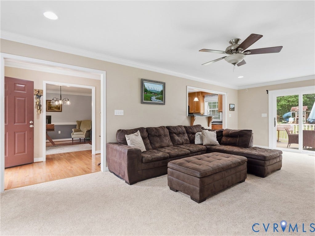 8325 Caroline Vines Way, Estates At Willis Church, Henrico, VA 23231 Carpeted living space featuring a ceiling fan with integrated lighting, recessed lighting, and crown molding
