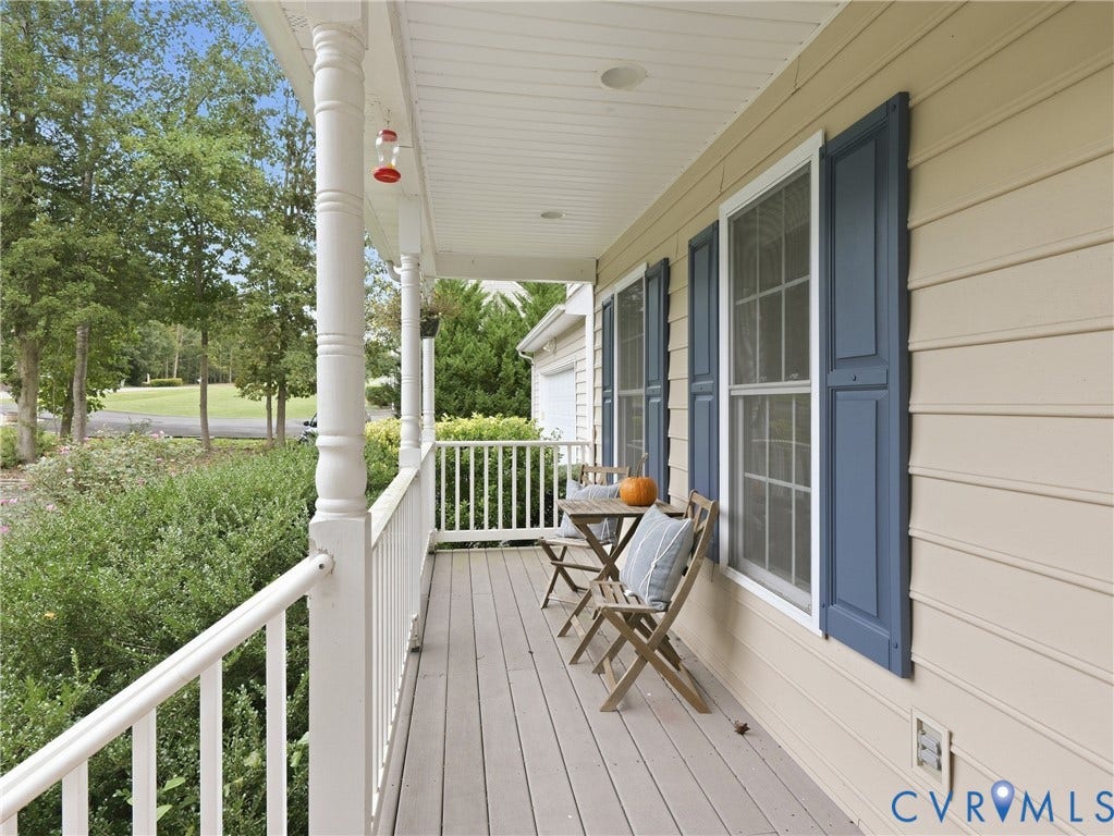 8325 Caroline Vines Way, Estates At Willis Church, Henrico, VA 23231 Covered porch with classic white railings, turned columns, light-toned siding, and blue louvered shutters